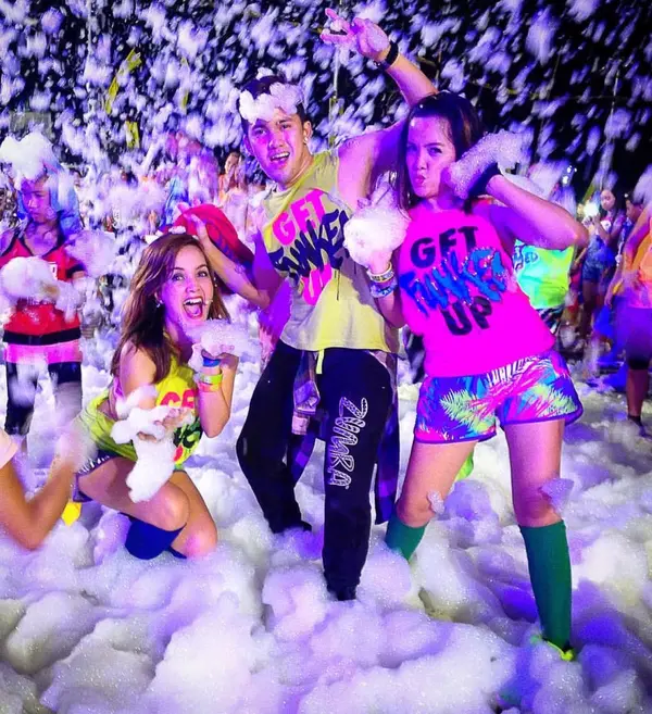 Party lights over a night foam party